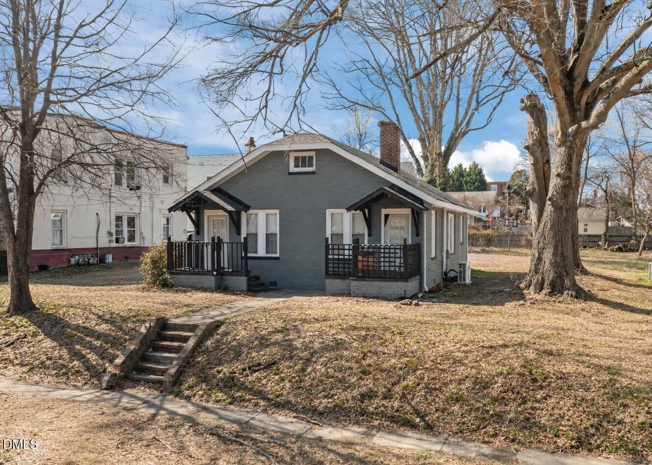 Grey brick bungalow duplex with dual porches — 204/206 W Holt St, Burlington NC